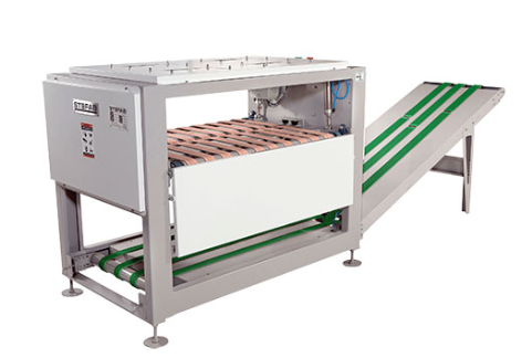 Automatic bed sheet stacker